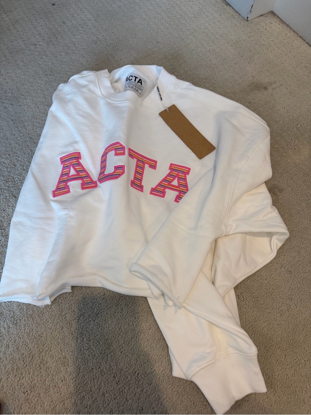 ACTA White Crewneck Sweatshirt with Pink Lettering Ken Cradic